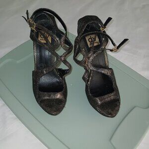 Gold and black stilettos